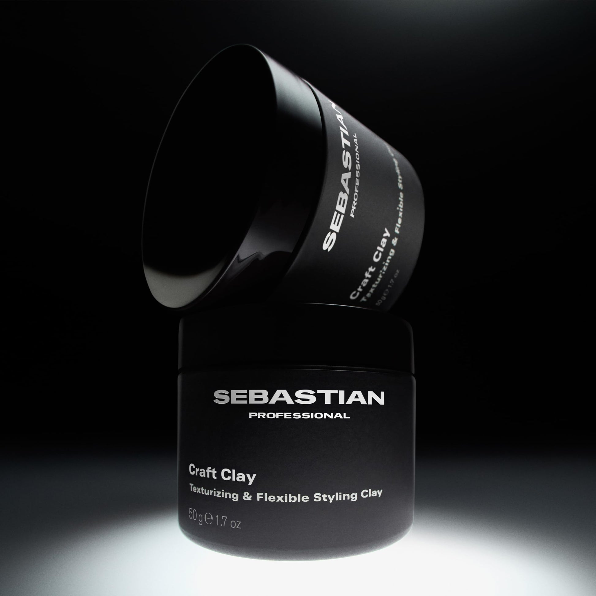 Sebastian Professional remoldable elastic hair texturizer being dispensed for salon styling