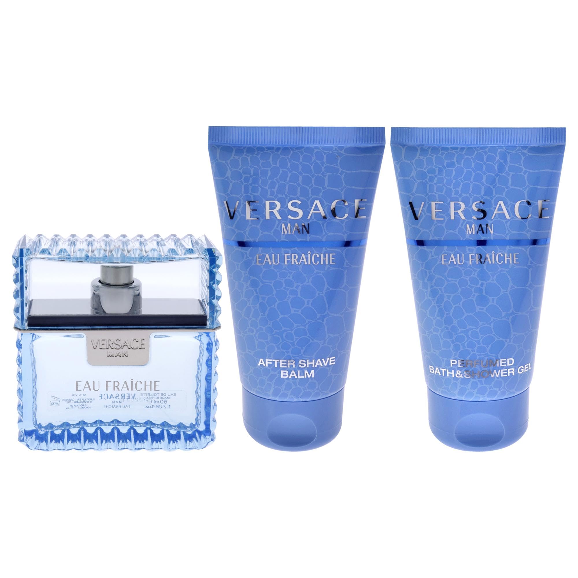 Authentic Versace three piece gift set items displayed out of packaging including cologne spray and grooming tubes
