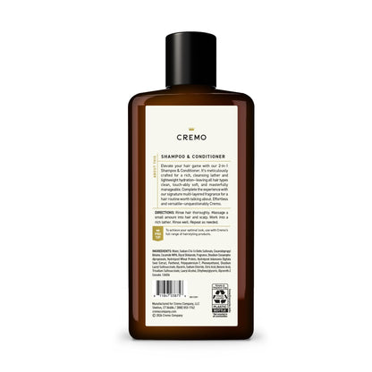 Top cap detail of the 16 fluid ounce Cremo shampoo bottle