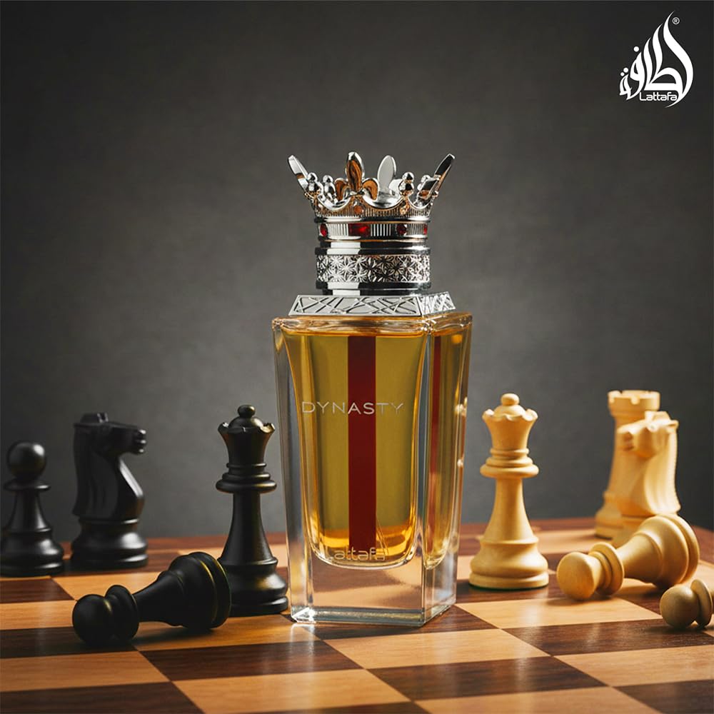 Lattafa Dynasty premium glass bottle showing gold detailing and unique cap design