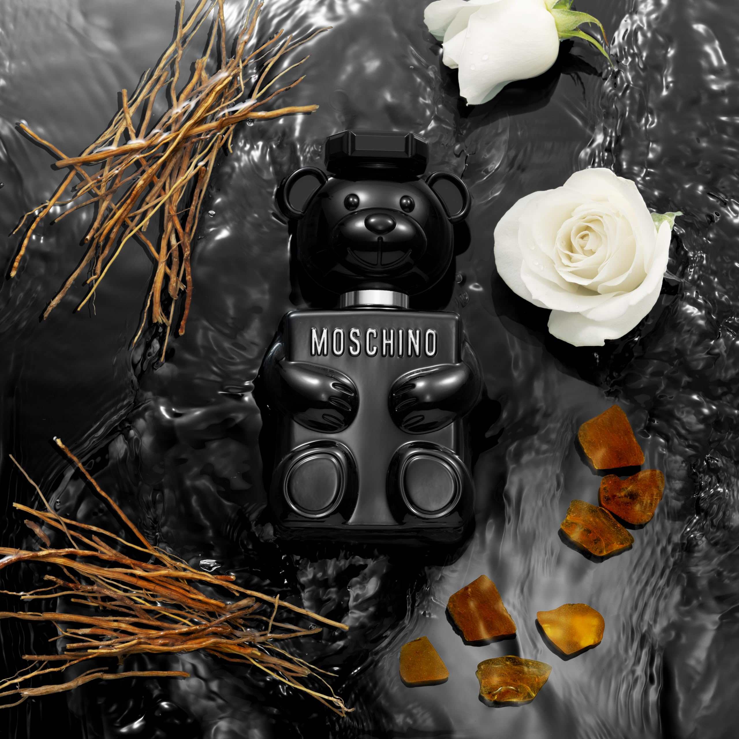 Side profile of Moschino Toy Boy luxury cologne highlighting the designer Jeremy Scott packaging