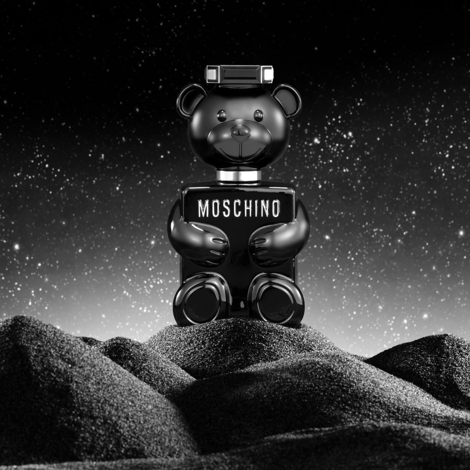 Authentic imported Moschino Toy Boy Eau De Parfum showing detailed bottle cap design