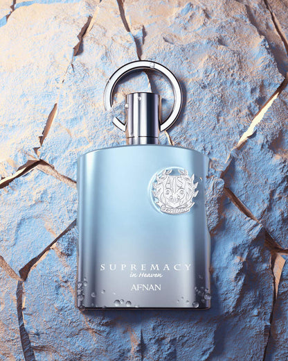 Close up shot of the metallic silver cap and intricate detailing on the Afnan Supremacy In Heaven bottle.