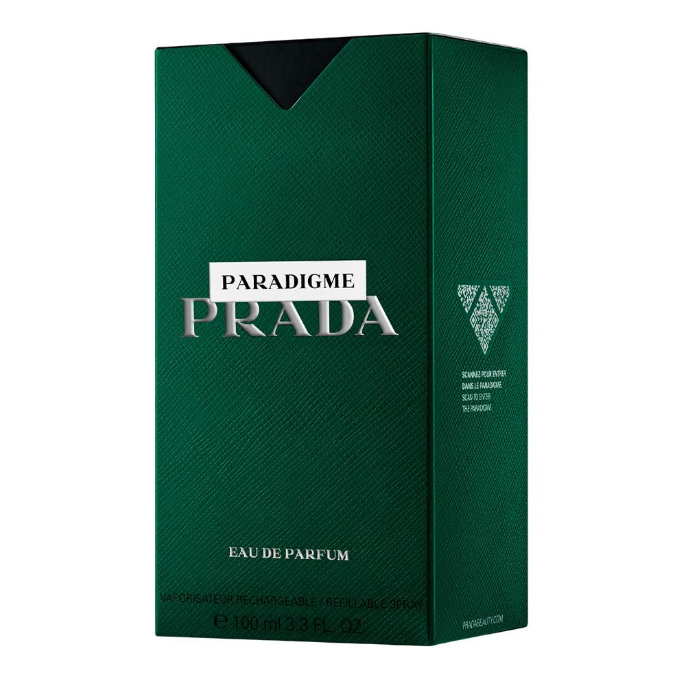 Prada Paradigme Eau De Parfum green glass bottle with silver cap resting on premium backdrop
