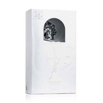 Premium silver bottle of Maahir Legacy by Lattafa showcasing intricate engraved details
