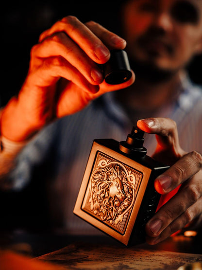 Rayhaan Lion 100ml long lasting men's fragrance display highlighting the signature gold details.