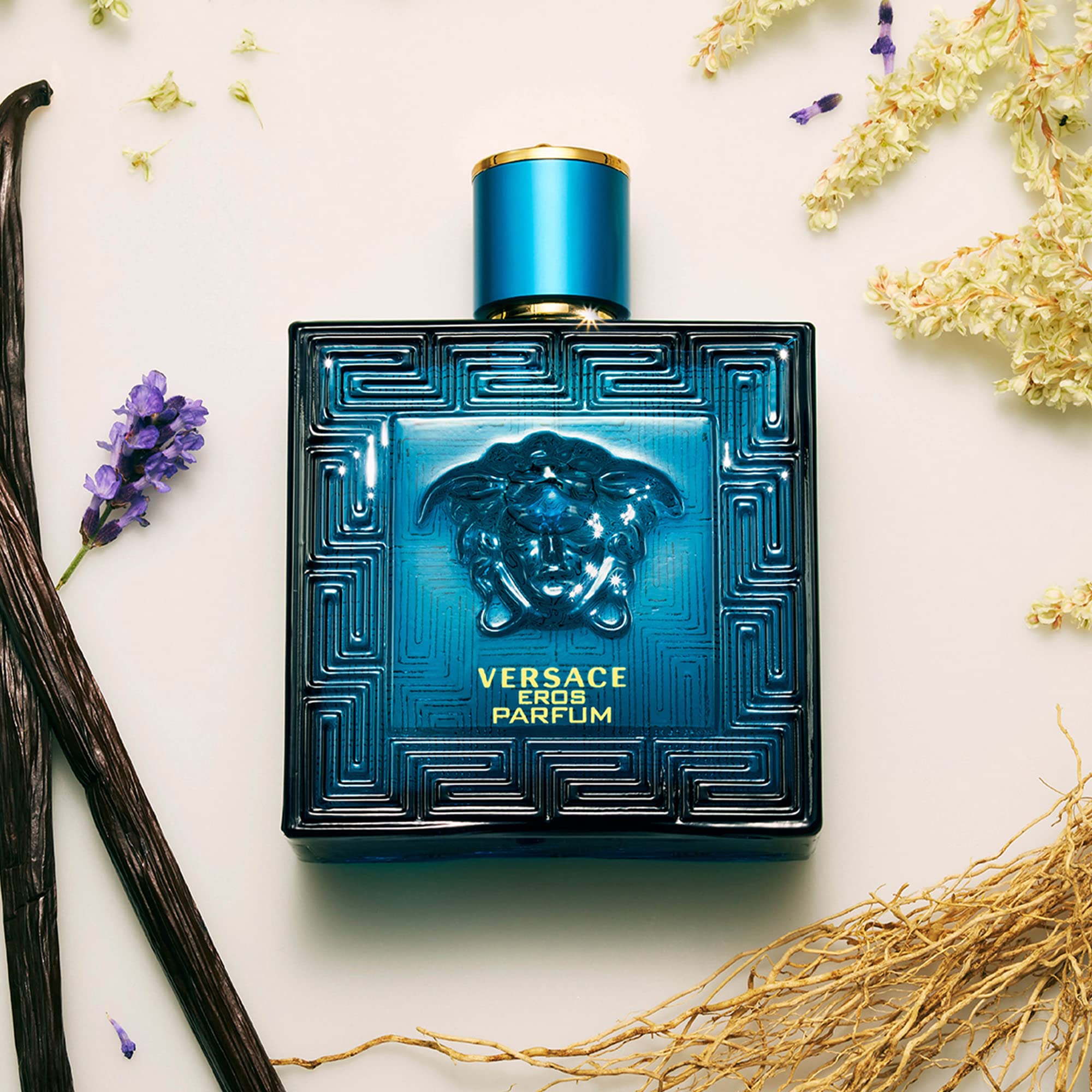 Close up view of the spray nozzle and gold accented cap of the Versace Eros luxury perfume