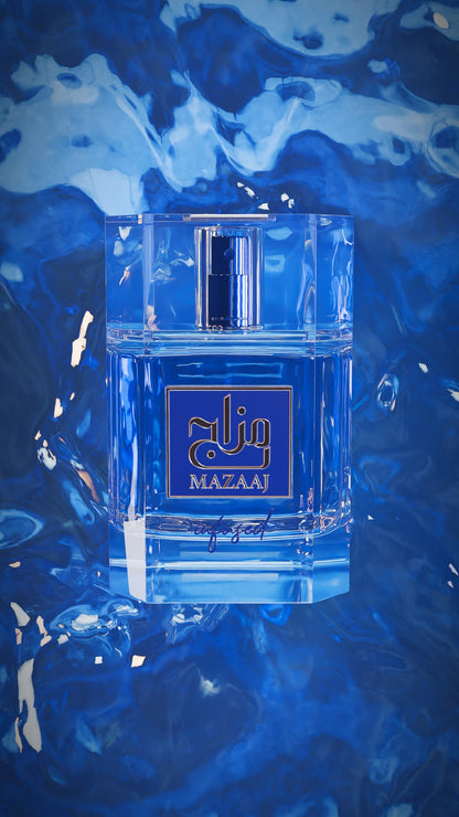 Zimaya Mazaaj Infused luxury men perfume bottle reflecting crisp blue tones against a minimalist background