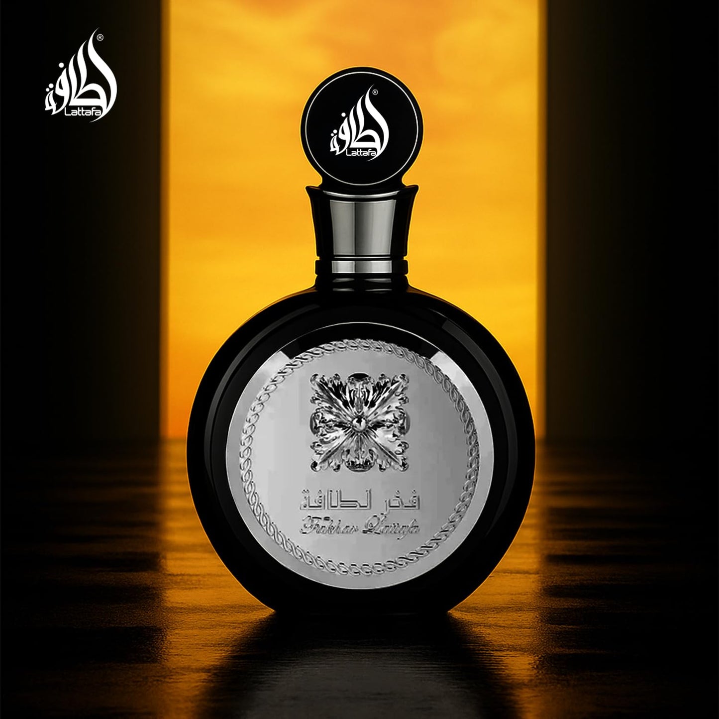 Lattafa Fakhar Black bottle displaying the authentic brand engraving and fluid ounces