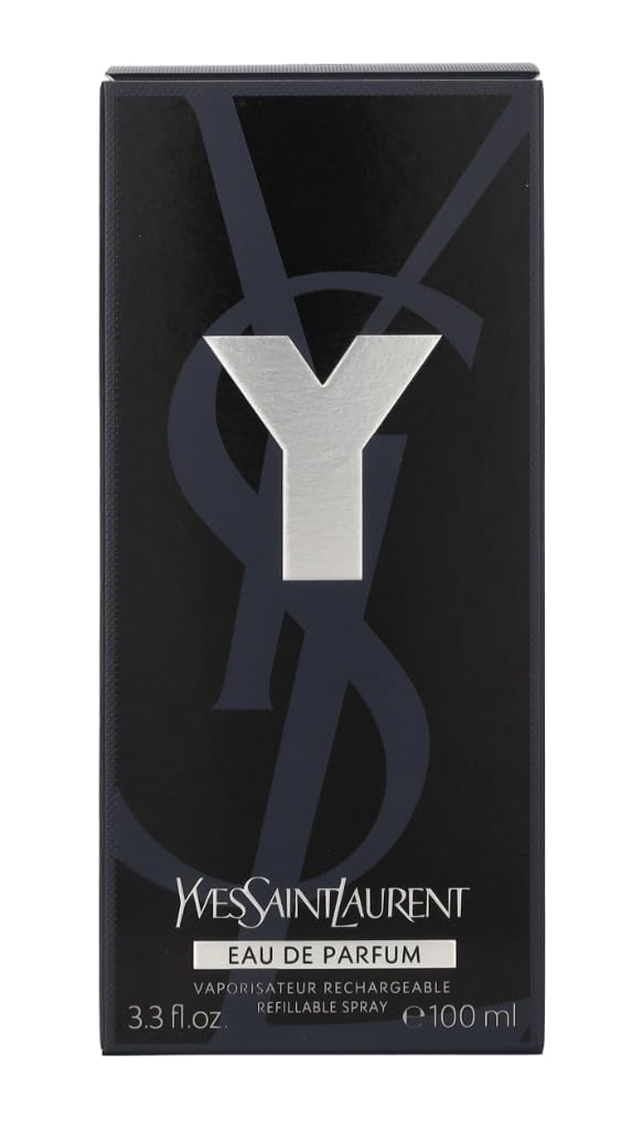The outer black box packaging of Yves Saint Laurent Y Eau de Parfum for men next to the fragrance spray.