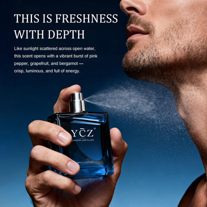 Ycz 1.7 ounce men's perfume bottle being held to demonstrate product size
