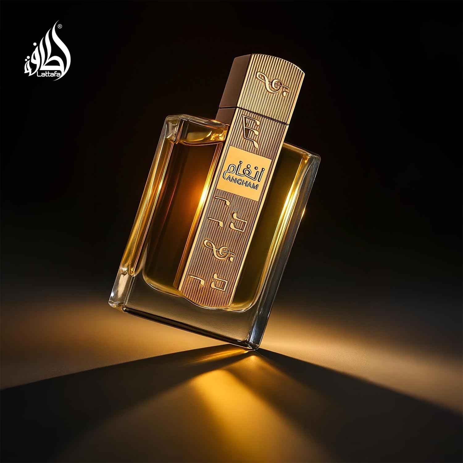 Close up view of the elegant golden cap and spray nozzle of the authentic Lattafa Angham perfume.