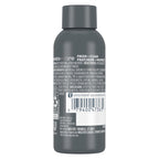 Close up of Dove Men Plus Care fortifying 2 in 1 formula bottle
