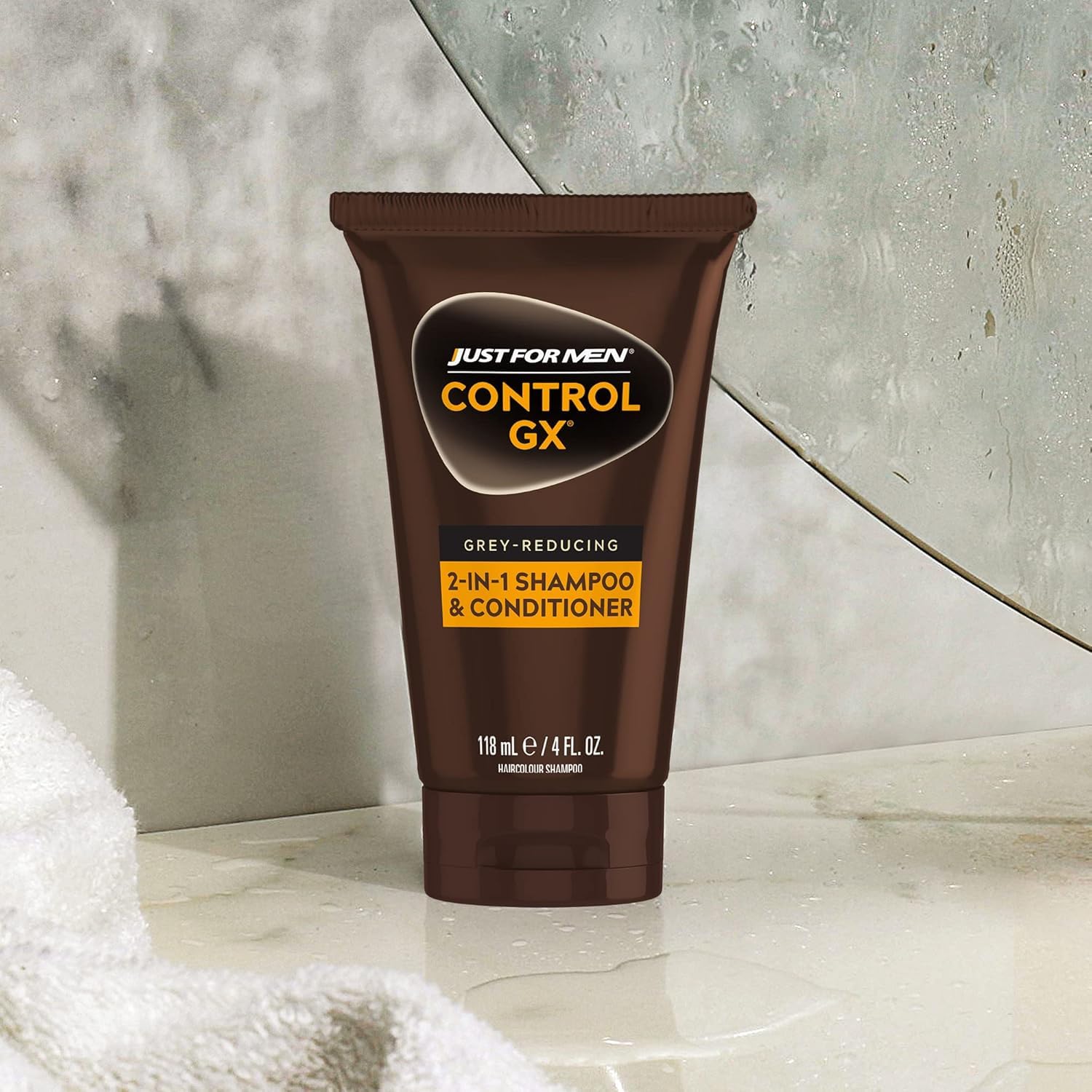 Just For Men Control GX shampoo being used in a bathroom setting
