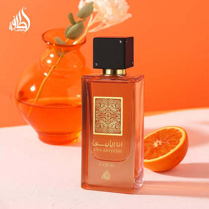 Authentic USA imported Lattafa Ana Abiyedh Coral bottle next to its retail display box.