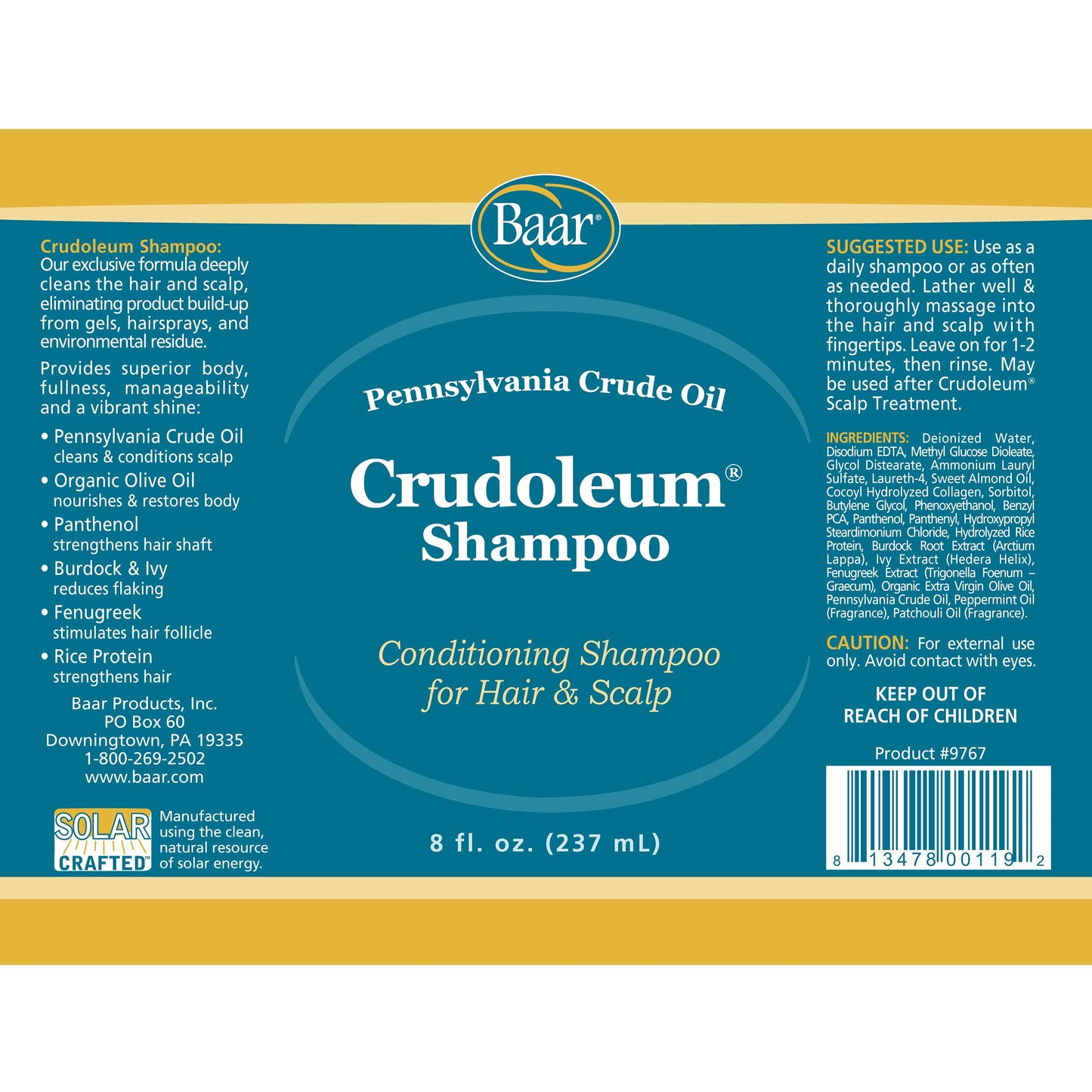 Baar Crudoleum shampoo bottle held in hand for scale