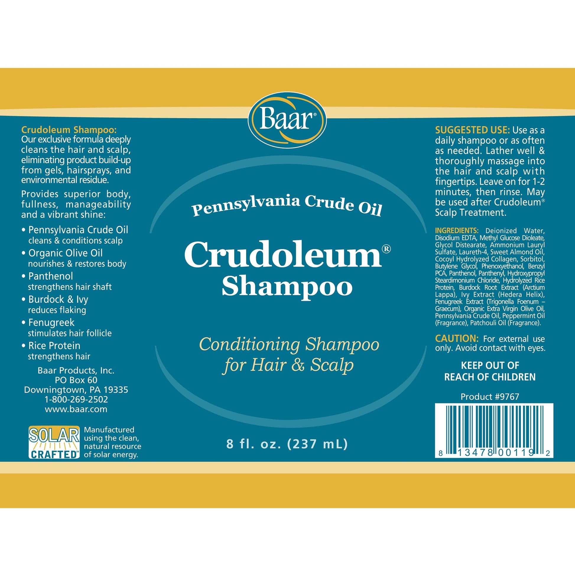 Baar Crudoleum shampoo bottle held in hand for scale