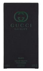 Gucci Guilty Black Eau de Toilette retail packaging box next to the glass spray bottle.