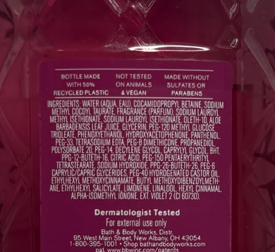Close up of the ingredients and fragrance notes on a 10 fl oz bottle of All Eyes On Her shower gel.