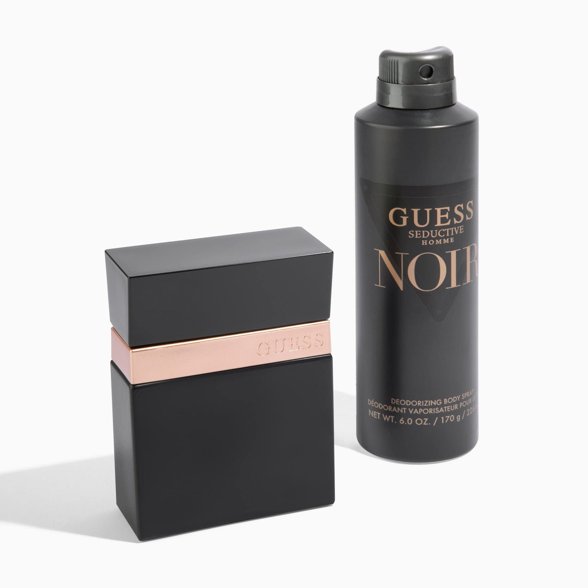 The complete packaging setup of the premium imported GUESS Seductive Noir masculine fragrance.