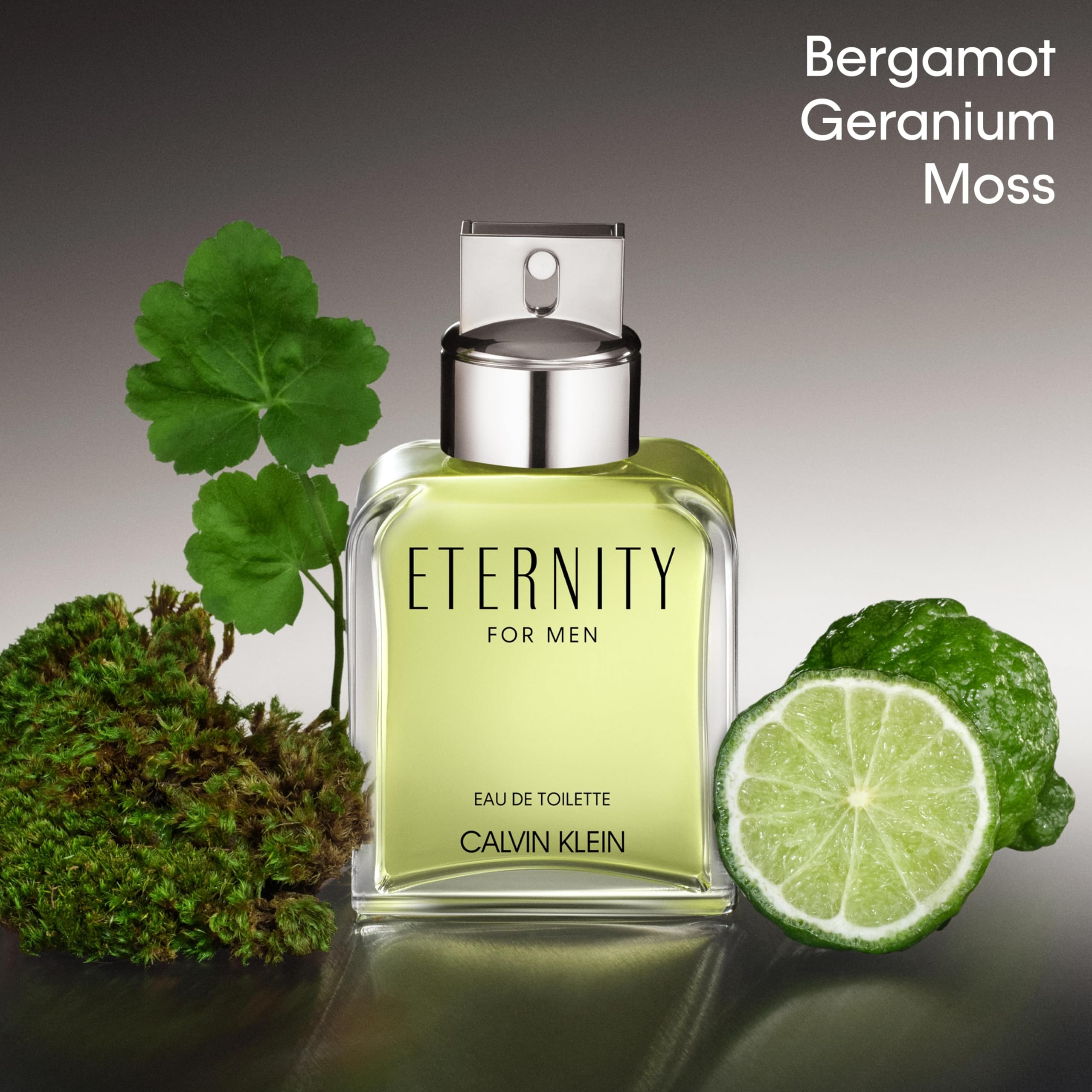Calvin Klein Eternity for Men clear glass bottle showing the light green fragrance liquid