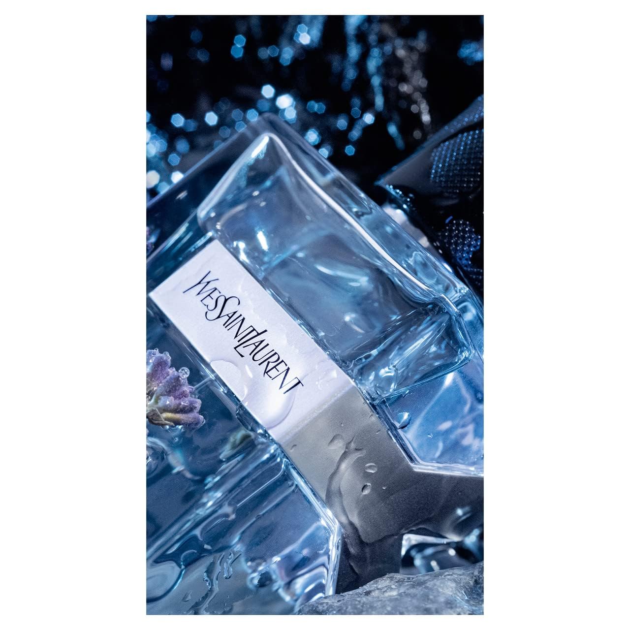 Side profile of Yves Saint Laurent Y luxury designer perfume for men highlighting the clean glass cuts