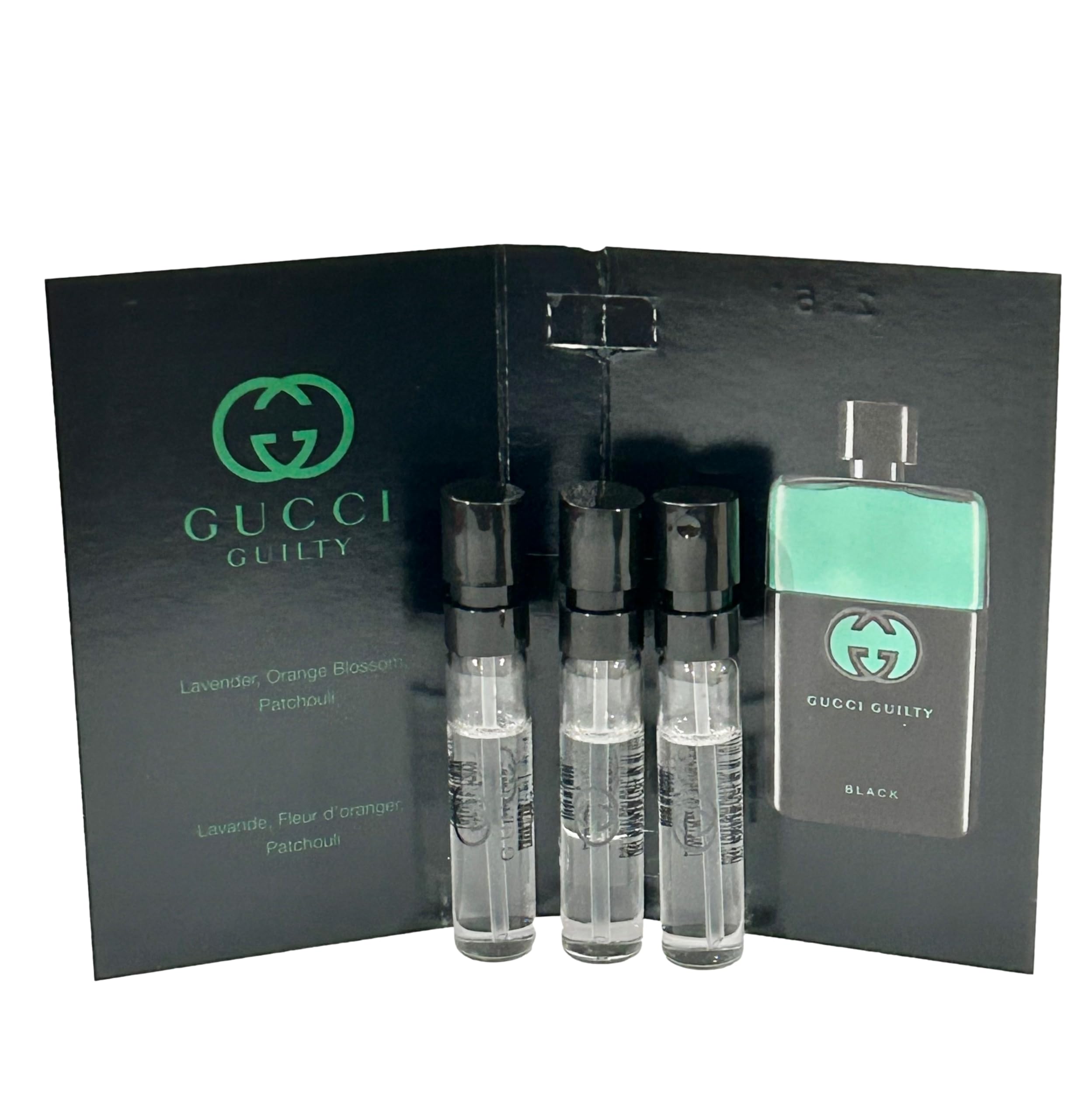 Three pieces of Gucci mini travel size luxury perfume sprays for men arranged on a clean background