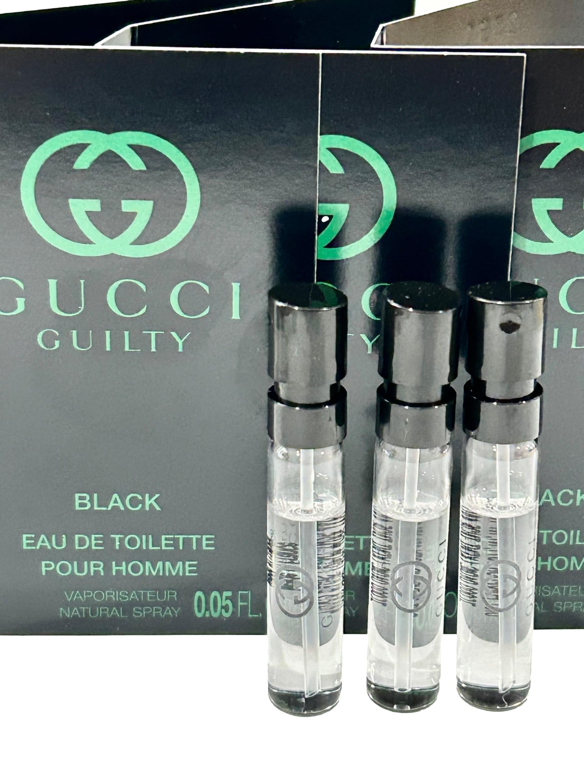 Close up view of the nozzle and 1.5 milliliter fluid capacity indicators on the authentic imported sample vial