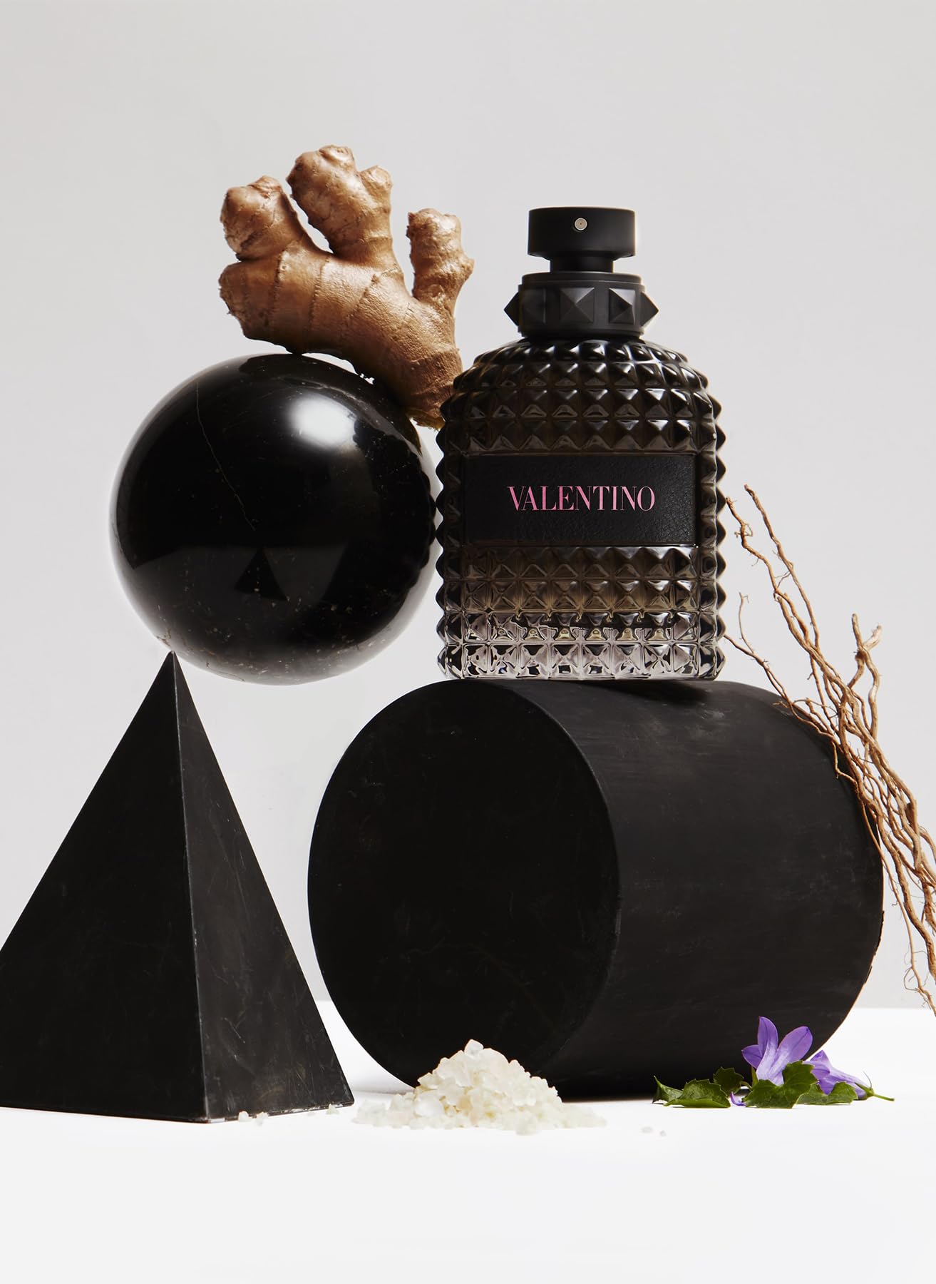 Luxury Valentino Uomo 1.7 Fluid Ounce perfume bottle for men on a clean background