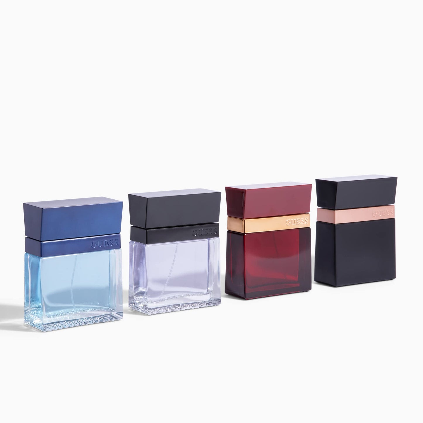 GUESS Seductive Homme Blue Eau De Toilette held in hand showing the actual retail size of the 3.4 fluid ounce bottle