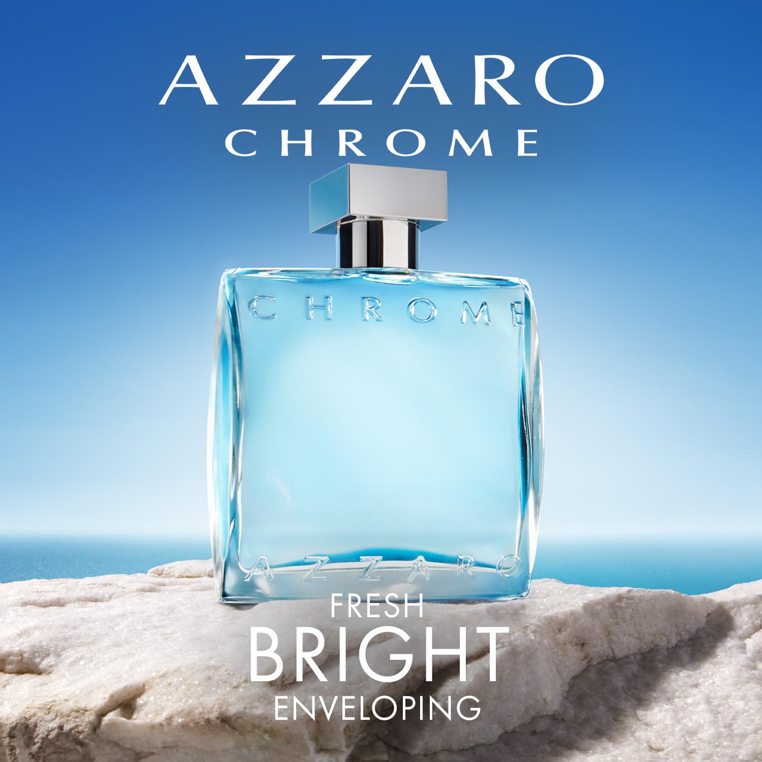Side profile of the Azzaro Chrome one fluid ounce luxury perfume bottle highlighting the blue-tinted liquid inside.