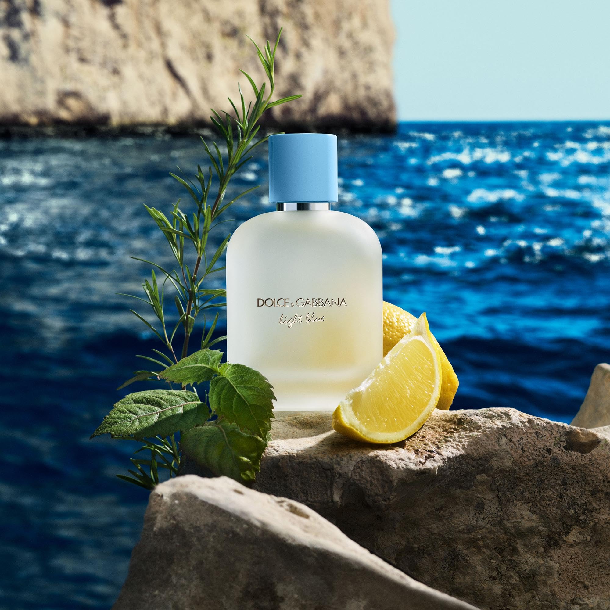 Side profile of Dolce and Gabbana Light Blue Pour Homme 3.3 Fluid Ounce bottle highlighting premium glass construction