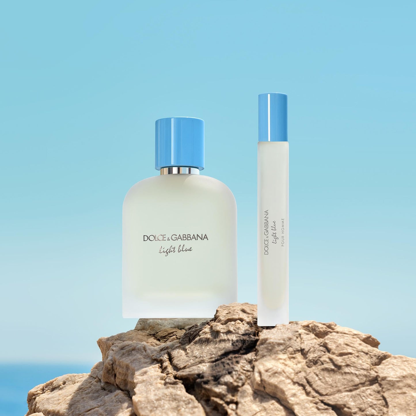 Dolce and Gabbana Light Blue Pour Homme designer bottle held in hand showing size proportion and ergonomic grip