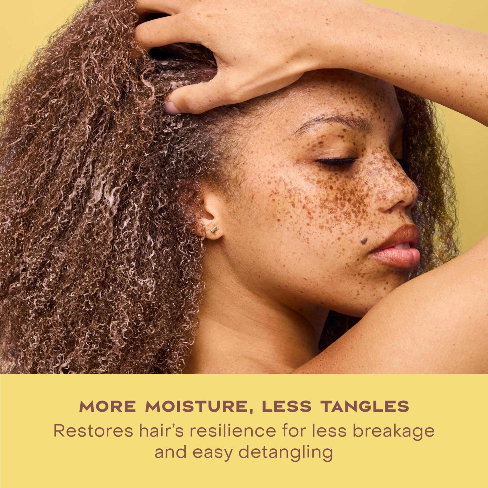 Applying Shea Moisture leave in conditioner to damaged hair