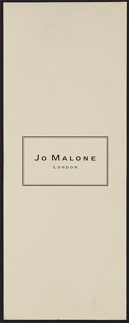 Jo Malone Nectarine Blossom and Honey 30ml glass bottle on vanity