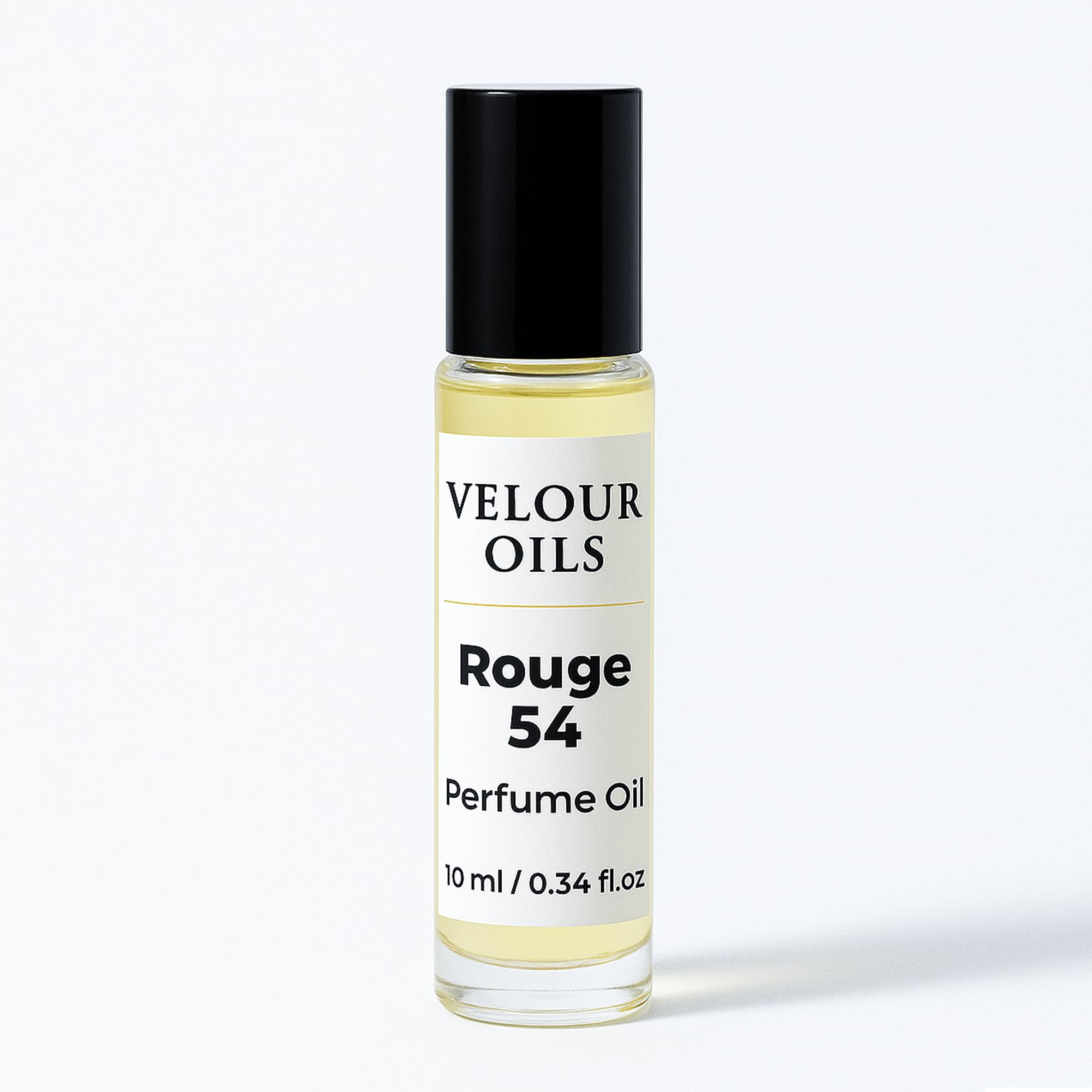 Close up of the amber woody fragrance oil bottle highlighting the travel friendly ten milliliter size.