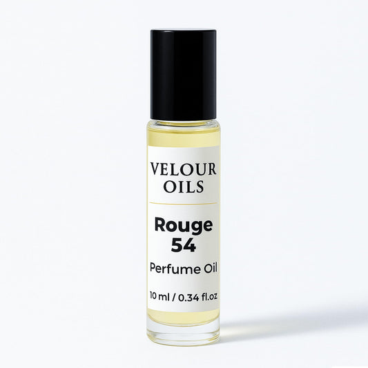 Close up of the amber woody fragrance oil bottle highlighting the travel friendly ten milliliter size.