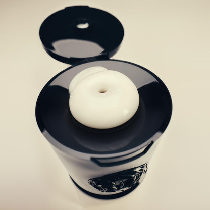 Oribe Gold Lust 6.8 fluid ounce tube showing premium gold and black aesthetic.