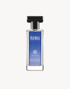 Close up view of the clear glass bottle design of Avon Night Magic evening musk perfume formulation.