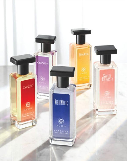 Side angle shot of the complete imported packaging of Avon Classics Night Magic cologne spray container.