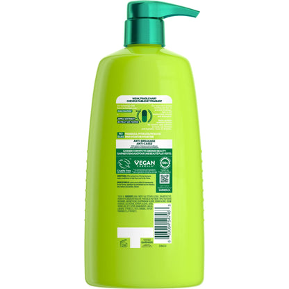 Close up of Garnier Fructis Grow Strong Conditioner pump bottle label details.