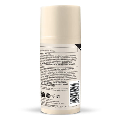Texture shot of the lightweight white HASK bond building treatment cream formula.