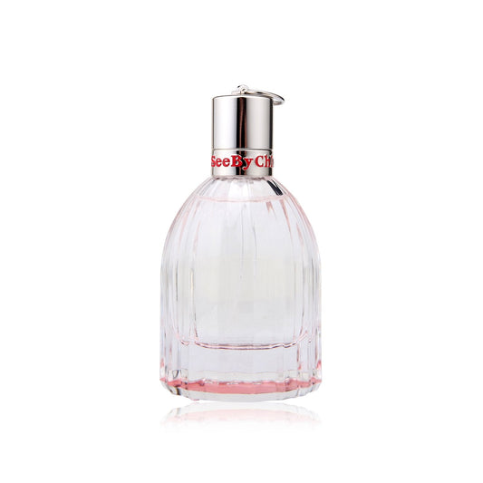 Chloe See By Chloe Eau Fraiche 1.7 Fluid Ounce ribbed glass bottle showing light pink fragrance fluid