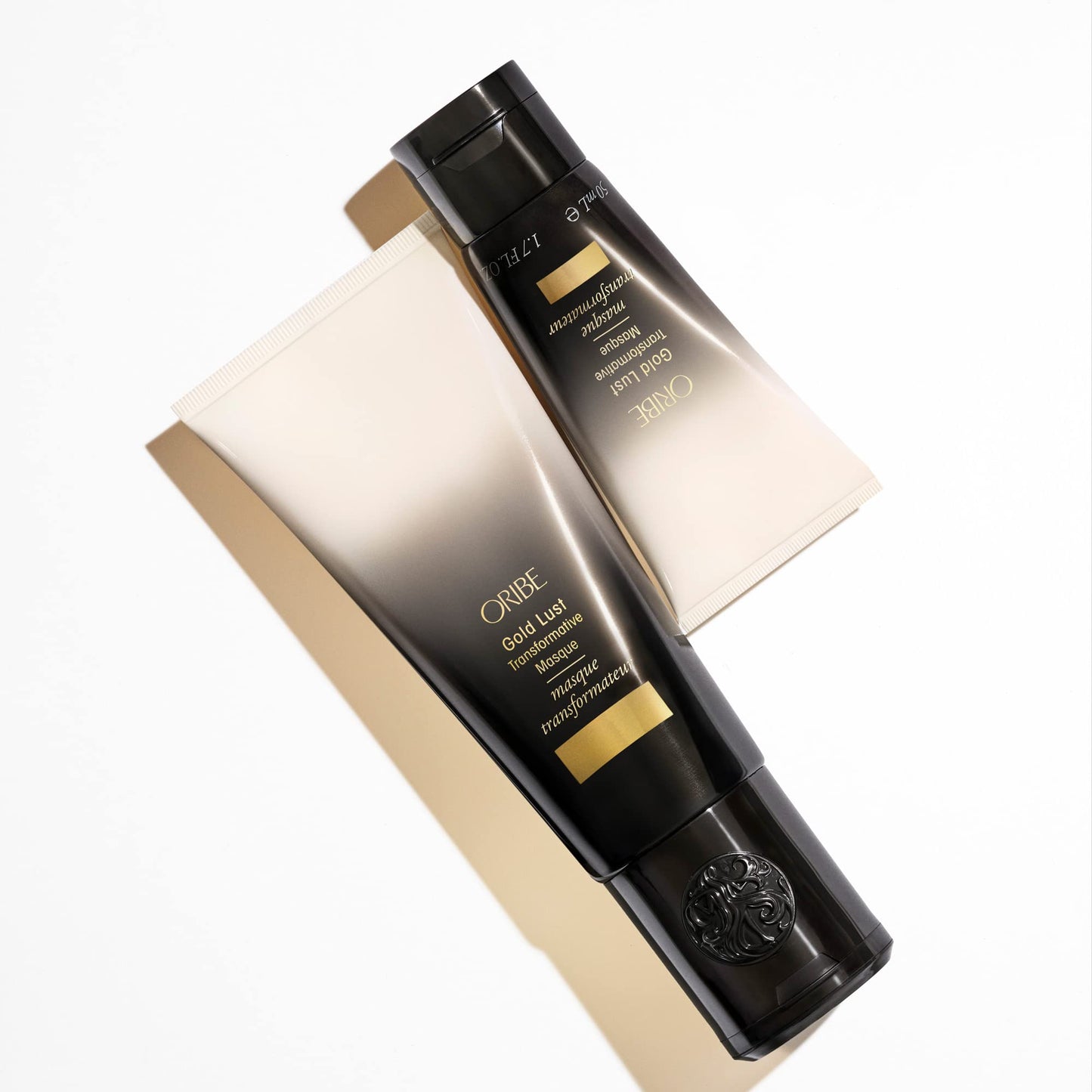 Texture of Oribe Gold Lust Transformative Masque demonstrating its rich conditioning formula