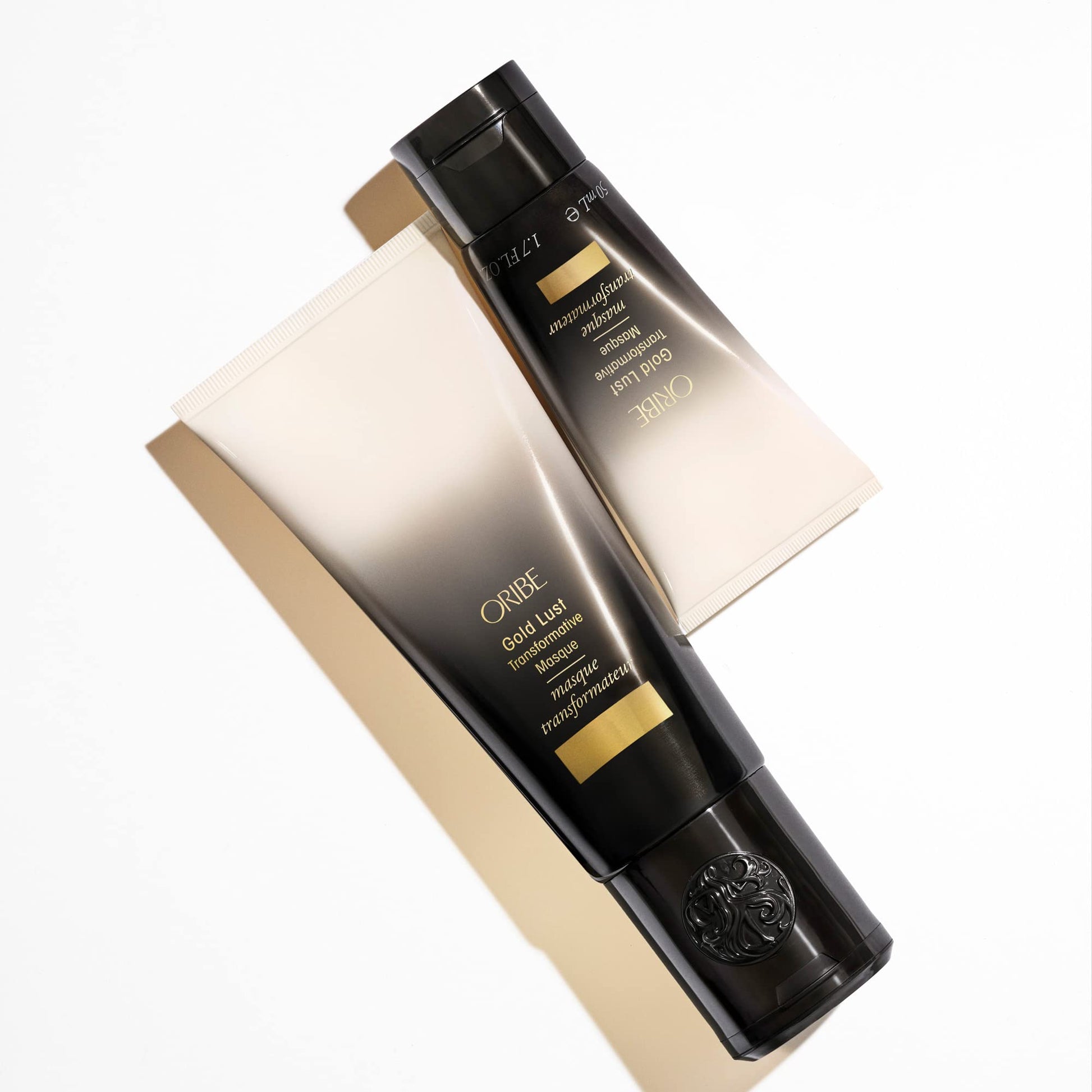 Texture of Oribe Gold Lust Transformative Masque demonstrating its rich conditioning formula
