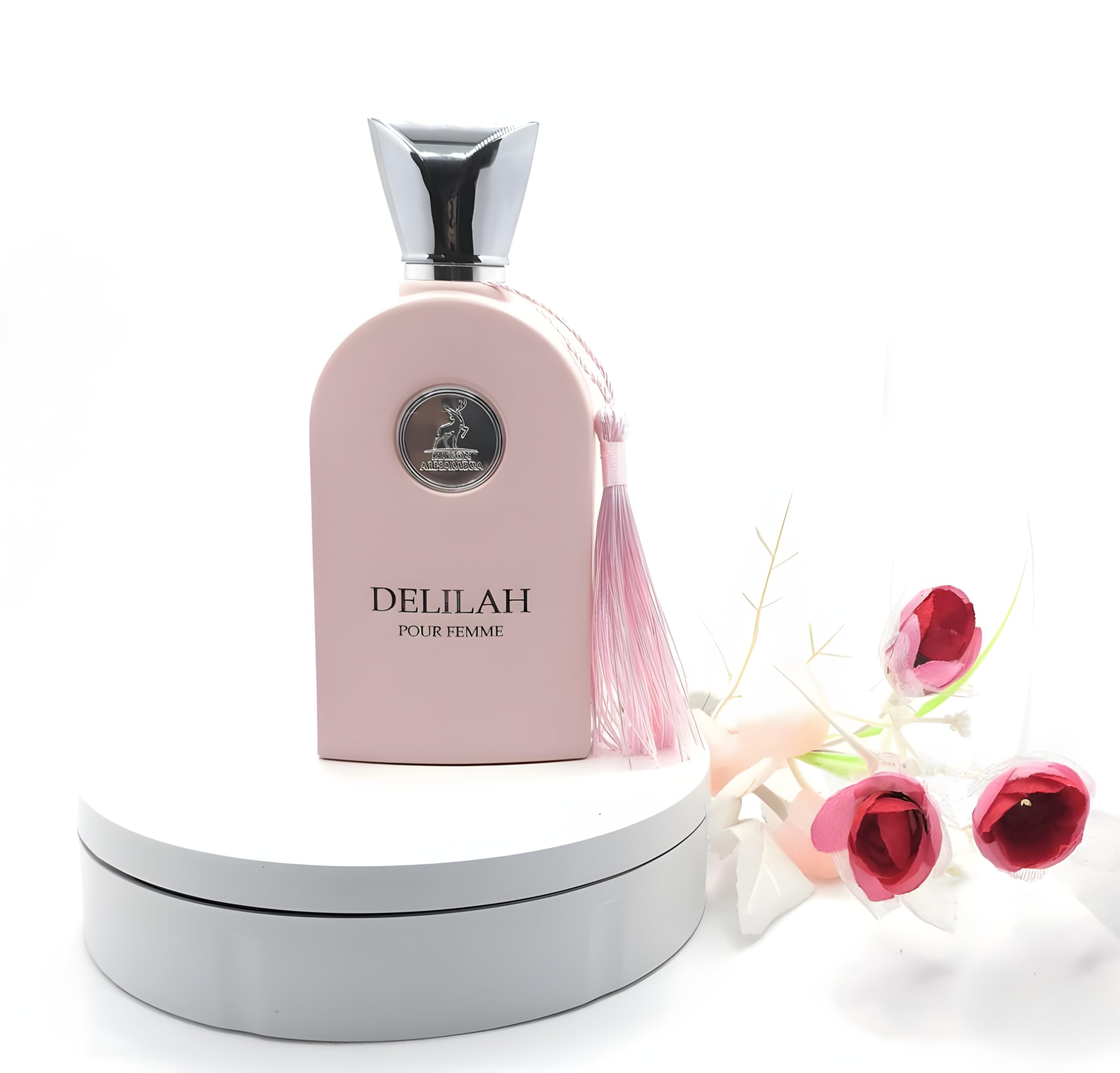 Authentic Delilah Pour Femme EDP bottle standing upright with its decorative cap removed.