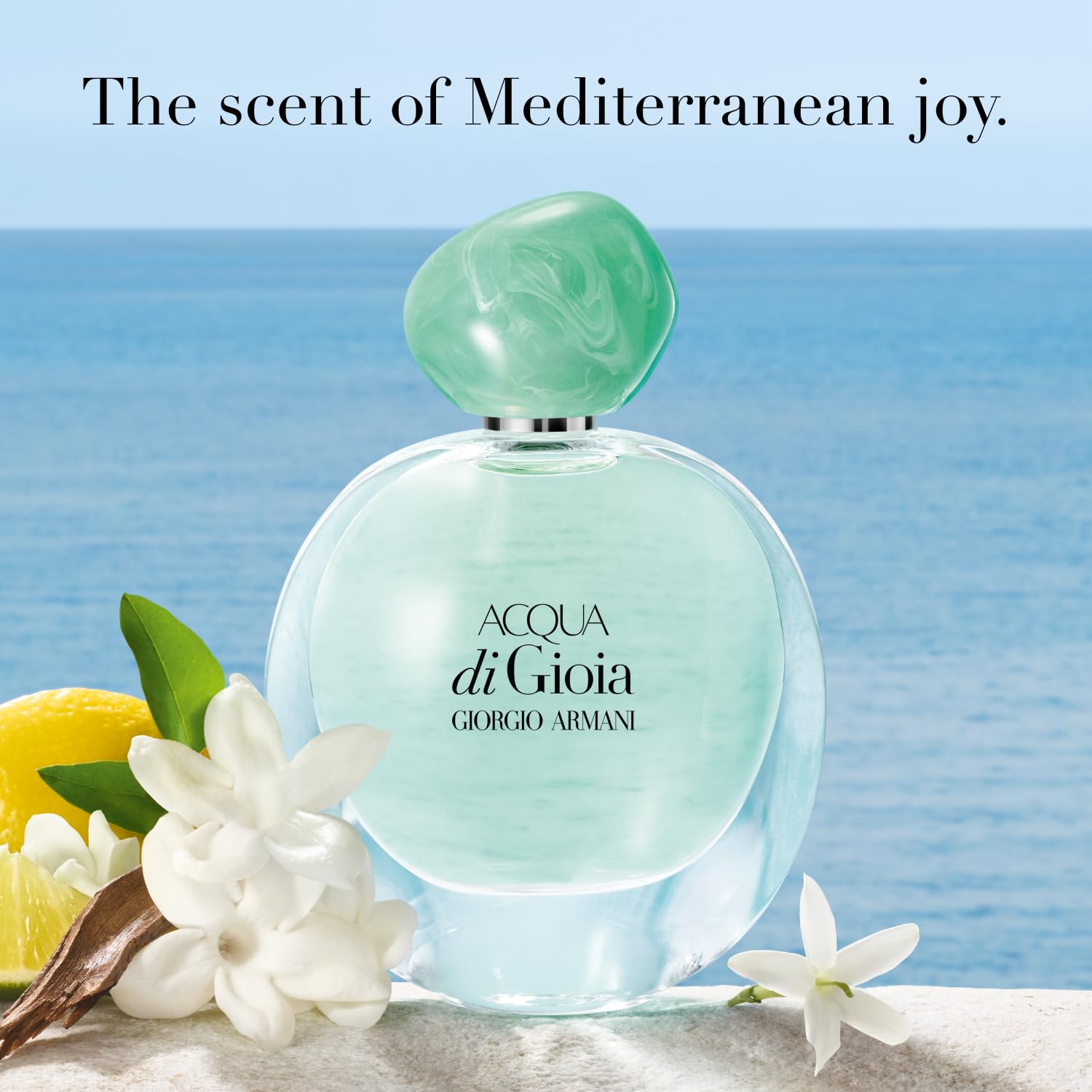 Armani Beauty floral aquatic fragrance travel spray showing the product details and cap.
