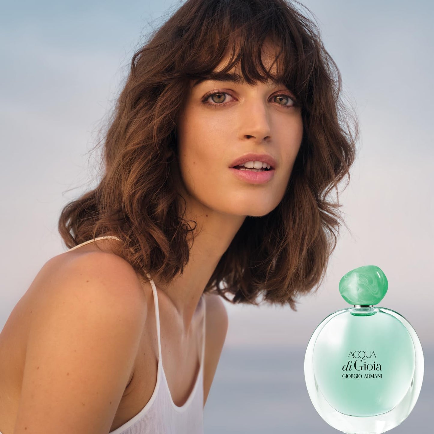 Luxury women's fragrance by Armani Beauty featuring lemon and jasmine notes.