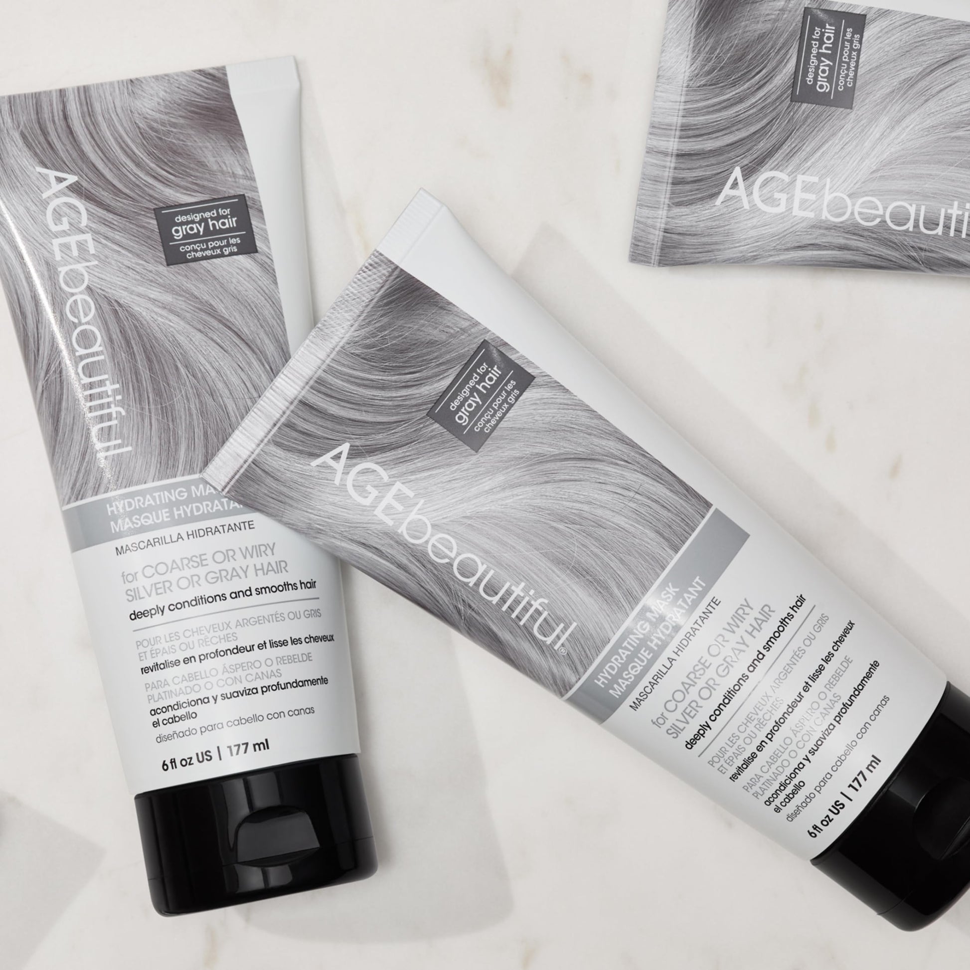 Texture shot of the rich white cream formula of AGEbeautiful hair mask for frizz control