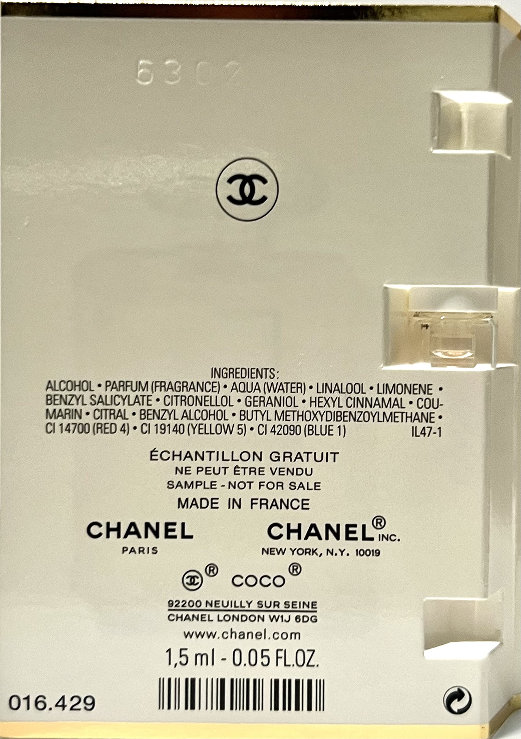 Chanel travel size fragrance spray for women on a flat lay background